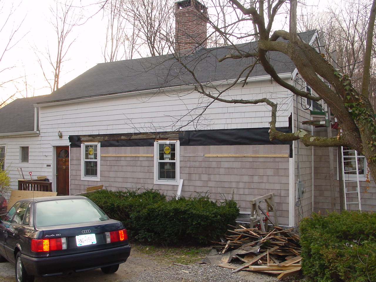 Cedar shingles going up on front
