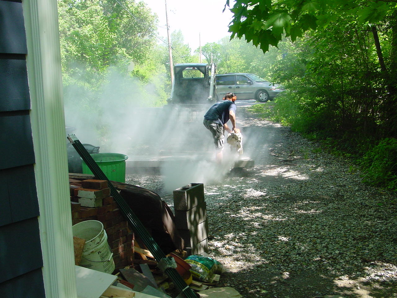 Pete cutting the back bluestone step